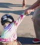 Young Girl Learning to Skateboard with Coach