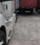 Semi Squeezes Into Tight Spot to Weather Storm