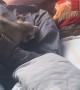 Man Sleeping with a Opossum