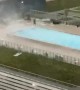 Pool Workers Scramble to Tie down Furniture during Intense Winds