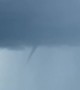 Funnel Forms Above Farmer's Crops