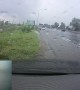 Truck Causes Close Call on Rainy Road