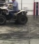 Donuts on a Four Wheeler in a Garage Doesn't go as Planned