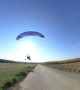 Paramotor Operator Surprises Mountain Board Rider in French Landscape