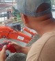 Construction Worker Uses Gaming Controller for Work