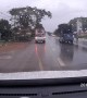 Truck Carrying Big Load Has Close Call on Slippery Road