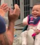 Sweet baby girl laughs at her dad\'s dance moves