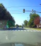 Near Miss With Motorcycle as Pickup Runs Red Light