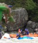 Kayaker Gets Stuck in Front of a Whitewater River Raft