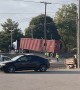 Train Rolls Through Stranded Semi