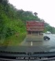 Motorcyclist Loses Control on Wet Roads