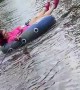 Woman goes tubing in the streets of Florida during Tropical Storm Eta