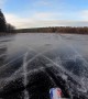 Motocross Rider Drives Across Beautiful Frozen Lake