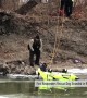 First Responders rescue stranded dog on a chunk of ice in the river