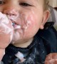 Happy Baby Makes a Mess Eating Yogurt