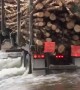Logging Truck Crosses Flooded Road