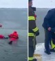 Firefighters rescue dog from frozen New York pond