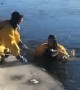 Firefighters rescue dog from icy river in Michigan