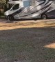 RV Slams Rooftop Into Tree