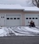Man in Wheelchair Impressively Clears Driveway of Snow