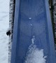 Curious Kitty Slips off Snow Filled Slide