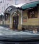 Person Walking on Sidewalk Has Close Call with Falling Snow