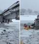 Firefighters rescue two people from submerged truck