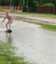 Dudes in Darwin Make the Most of Wet Weather