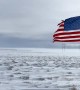American Flag Blowing in Freezing Landscape