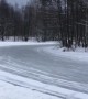 Group of Cars Slide Around Icy Corner