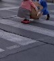 Man Crosses Street in Creative Costume