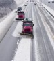 Snow fighters use synchronized snow plowing technique to clear highway