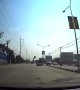Car Has Close Call with Truck Making U-Turn