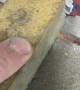 Turning a Nokia 3220 to Dust Using Belt Sander