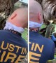 Firefighters rescue squirrel with head stuck in a tree