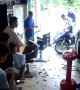 Out of Control Scooter Smashes Into Barbershop