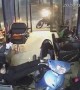 Scooter Crashes into Shop