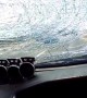 Truck Tire Flings Road Debris through Windshield