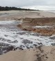 Lagoon Breaks Through the Sand Into the Sea