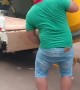 Man Loads Concrete Mixer into a Truck by Himself