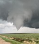 Storm Chaser Walks Towards Tornado