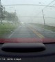 Strong Storms Push Power Lines Onto Road