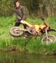 Boy Throws Flaming Dirt Bike into Lake and Retrieves it