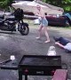 Guy Fleeing Water Gun Fight Knocks Over Two Kids