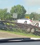 Truck Driver Takes Towed Cars on Grassy Detour