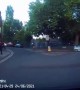 Two Cars Speed Past Car on Slow Street