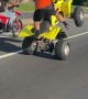 Man on Yellow Four-Wheeler Pulls Impressive Stunts