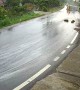 Speeding Truck Tips Over on Slippery Road