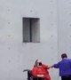 Woman in wheelchair dances with partner at concert