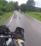 Motorcyclist Rides Close to Bison